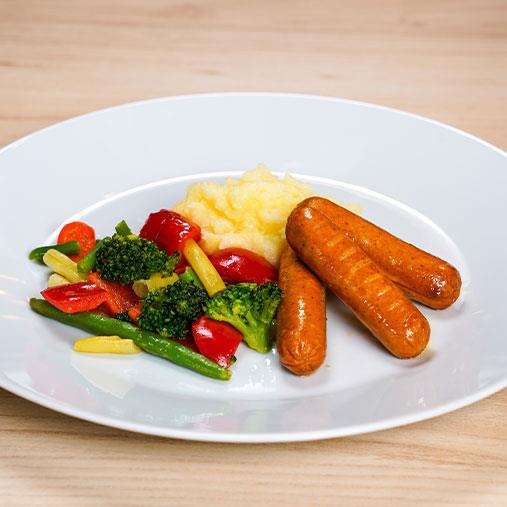 Veggie korv med potatismos och grönsaker